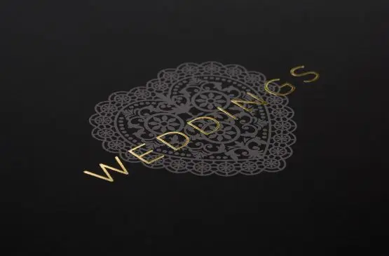 A close up of the front cover foiling detail from the Channels Weddings brochure
