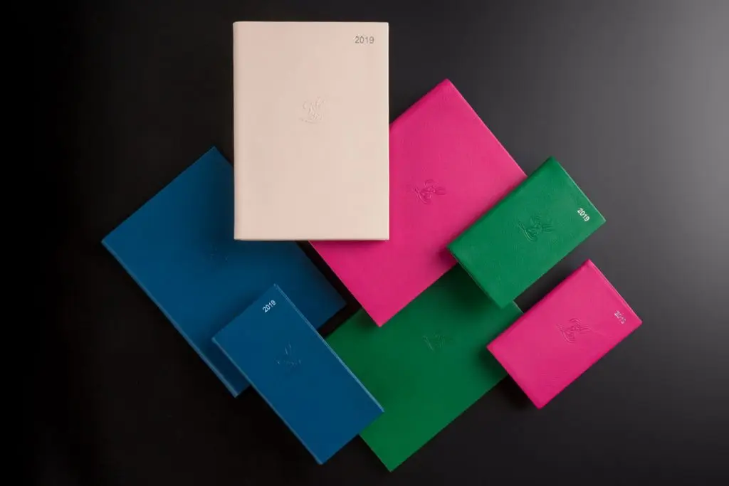 A collection of colourful Charfleet 2019 diaries, taken in our photography studio